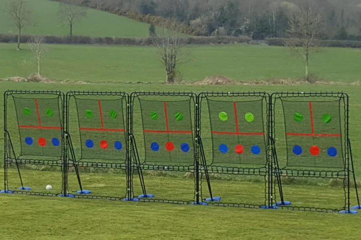 Five SkillMaster Units in a straight line displayed at The Kick Co grounds playing field.